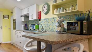 Dishwasher, highchair, cookware/dishes/utensils, freezer