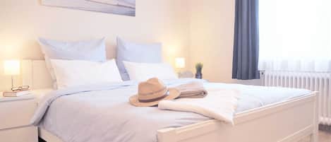 2 bedrooms, travel cot, WiFi, bed sheets