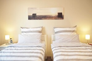 2 bedrooms, travel cot, WiFi, bed sheets
