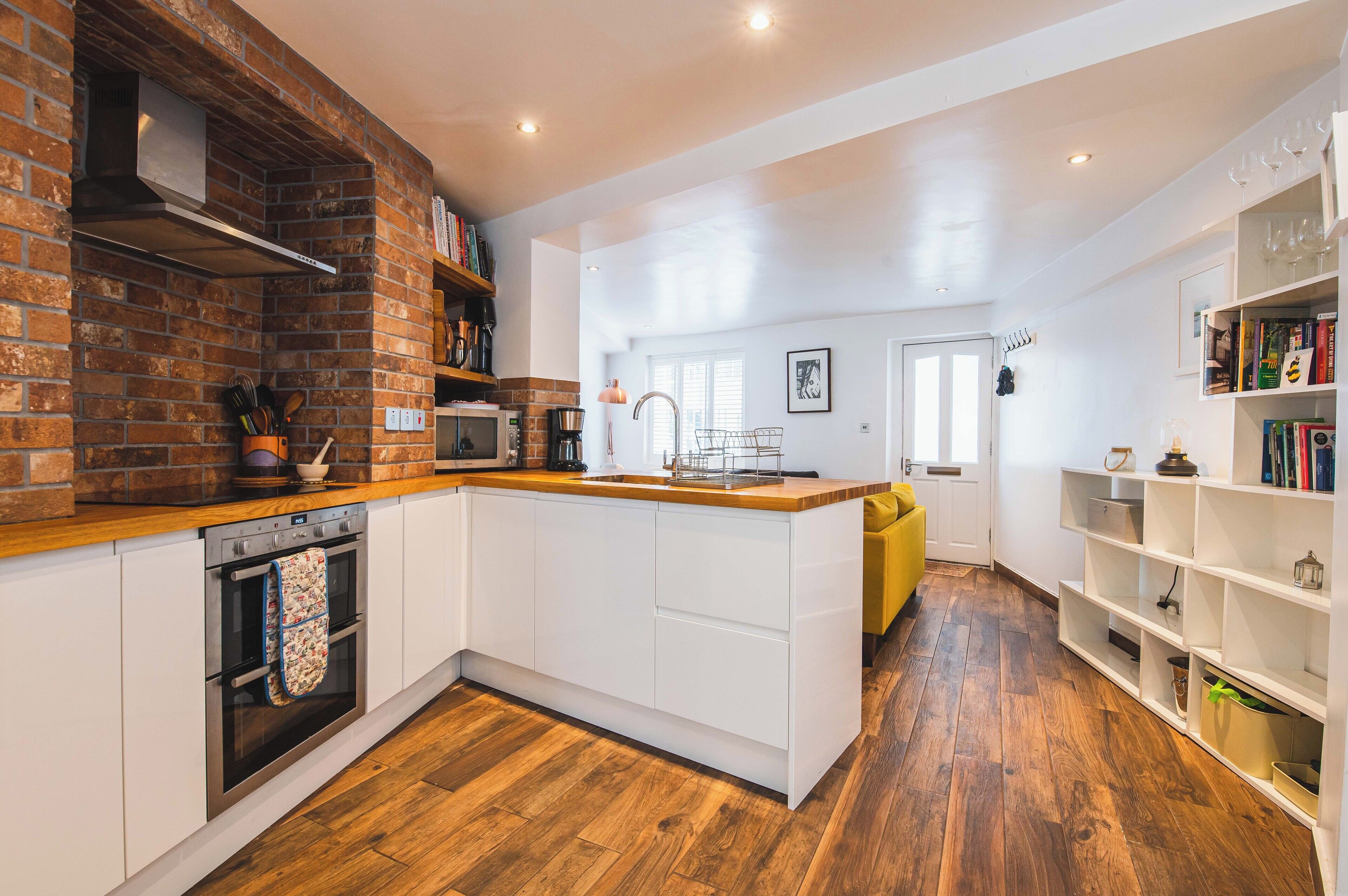 Microwave, toaster, cookware/dishes/utensils, dining tables