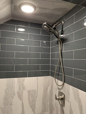 Combined shower/tub, hair dryer, towels, soap