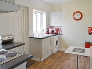 Highchair, cookware/dishes/utensils, freezer