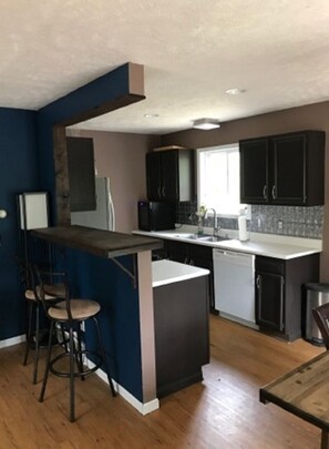 Fridge, microwave, dishwasher, coffee/tea maker