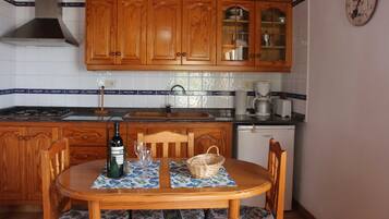 Fridge, electric kettle, highchair, dining tables