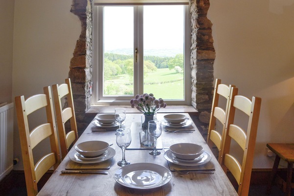 Dining area with lovely countryside views | Mountain View - Cefncoedbach Farm, Sarnau, near Brecon