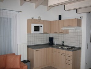 Fridge, microwave, dishwasher, high chair