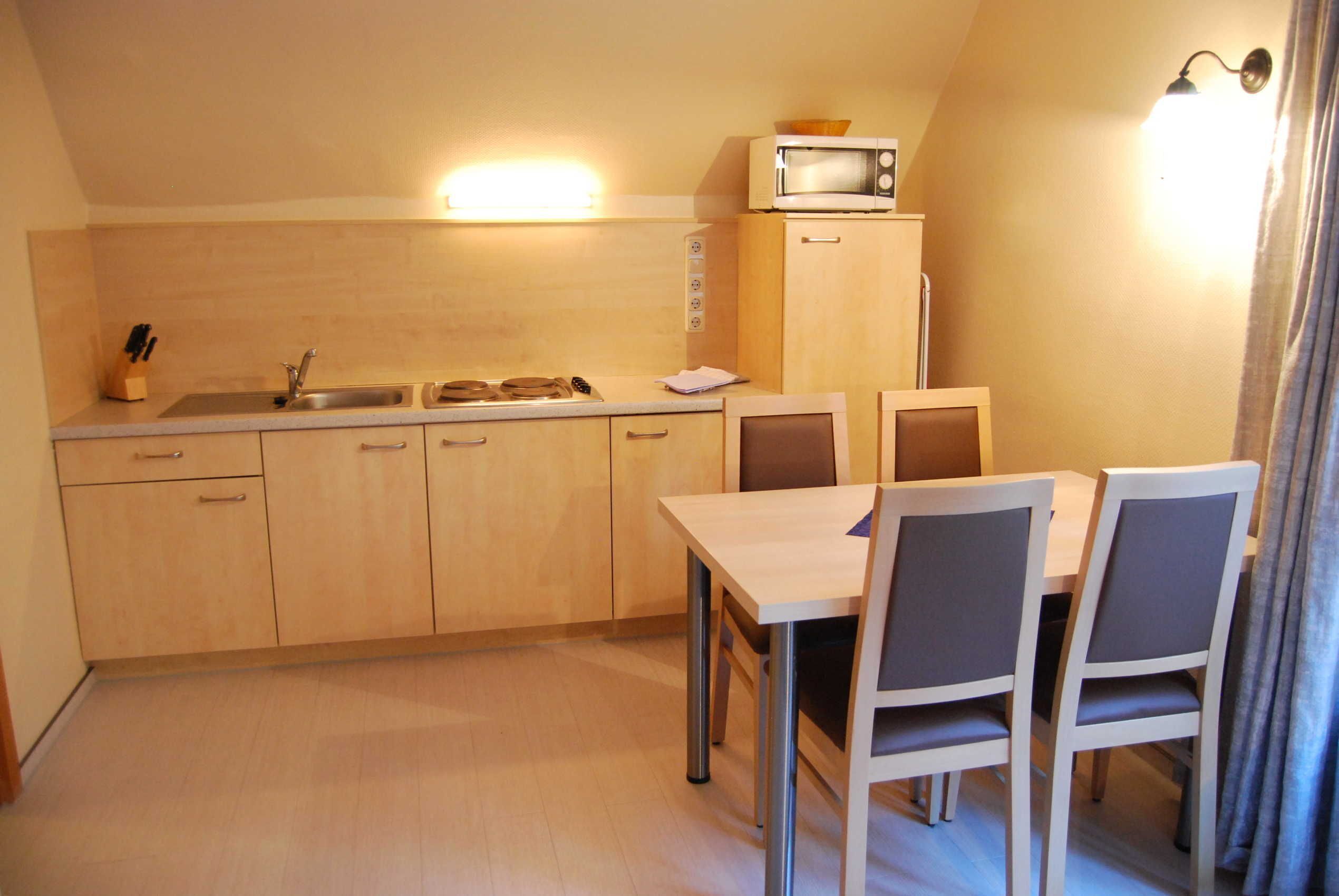 Fridge, microwave, high chair