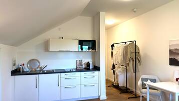 Fridge, microwave, electric kettle, toaster