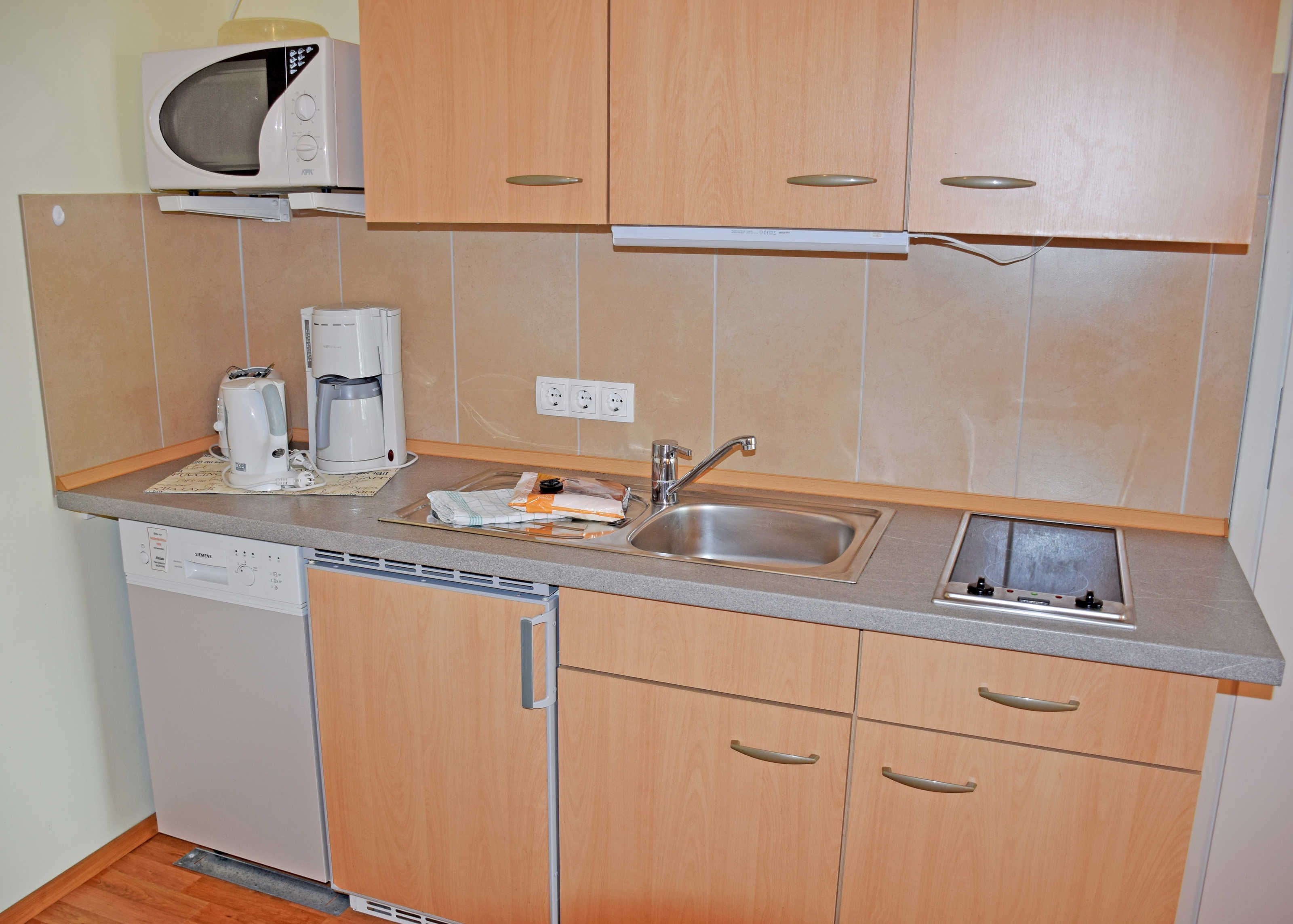 Frigorifero, lavastoviglie, macchina per tè/caffè, bollitore elettrico