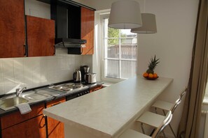 Fridge, microwave, oven, coffee/tea maker