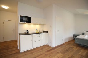 Fridge, microwave, electric kettle, toaster