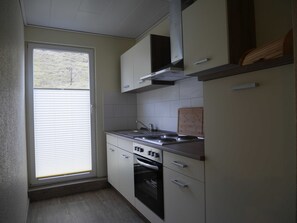 Een koelkast, een oven, een vaatwasser