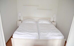 2 bedrooms, travel crib, WiFi, bed sheets