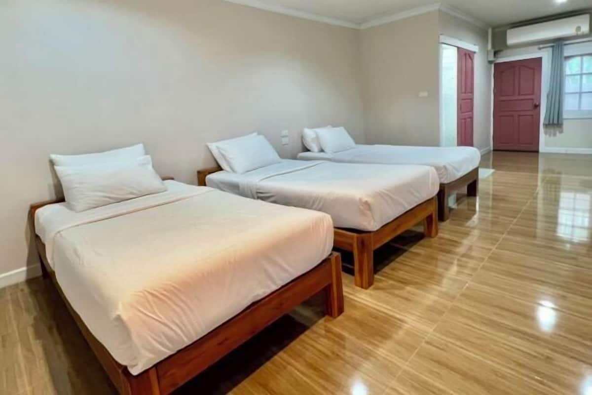 Premium bedding, desk, laptop workspace, blackout drapes