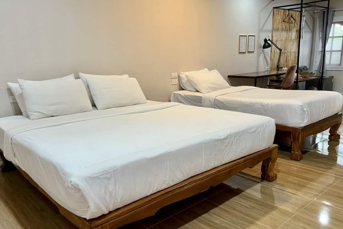 Superior Triple Room, Multiple Beds | Premium bedding, desk, laptop workspace, blackout drapes