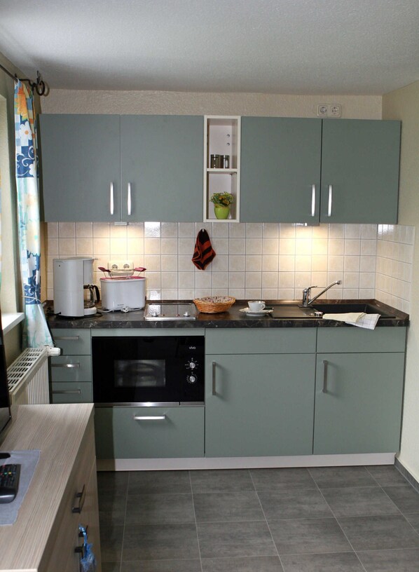 Imagen sin descripción, 1 de 12, botón