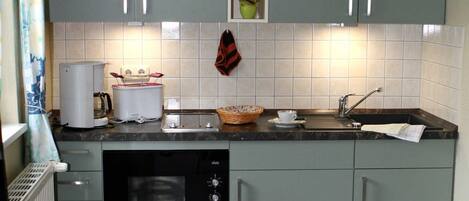 Fridge, microwave, coffee/tea maker, electric kettle