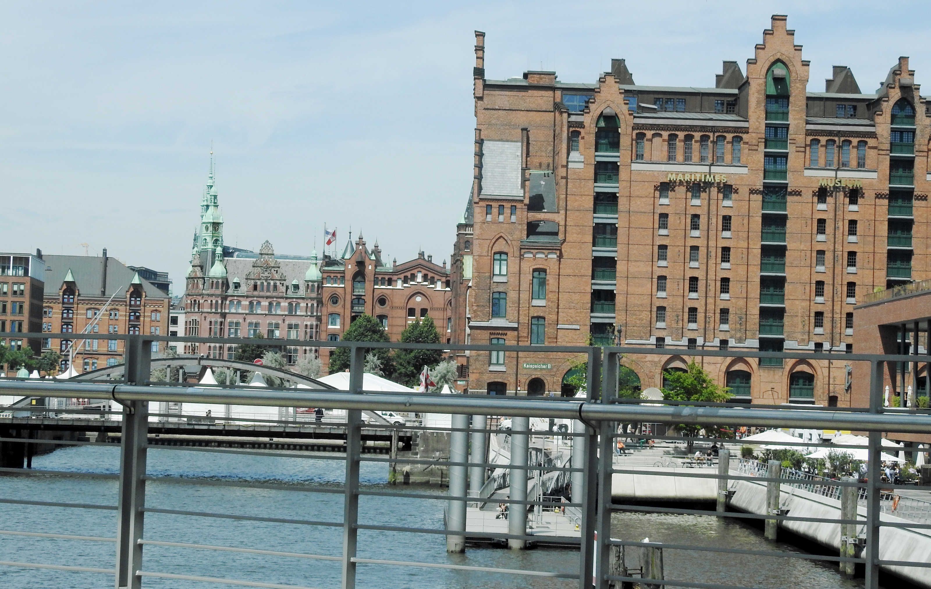 A waterfront view with a prominent building labeled 'Maritime Museum' and a bridge in the foreground.