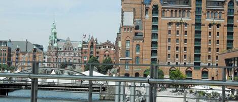 A waterfront view with a prominent building labeled 'Maritime Museum' and a bridge in the foreground.