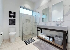 Shower, hair dryer, towels, soap