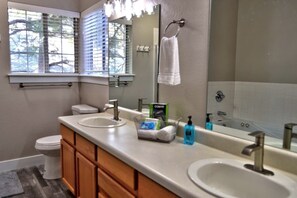 Bathtub, hair dryer, towels