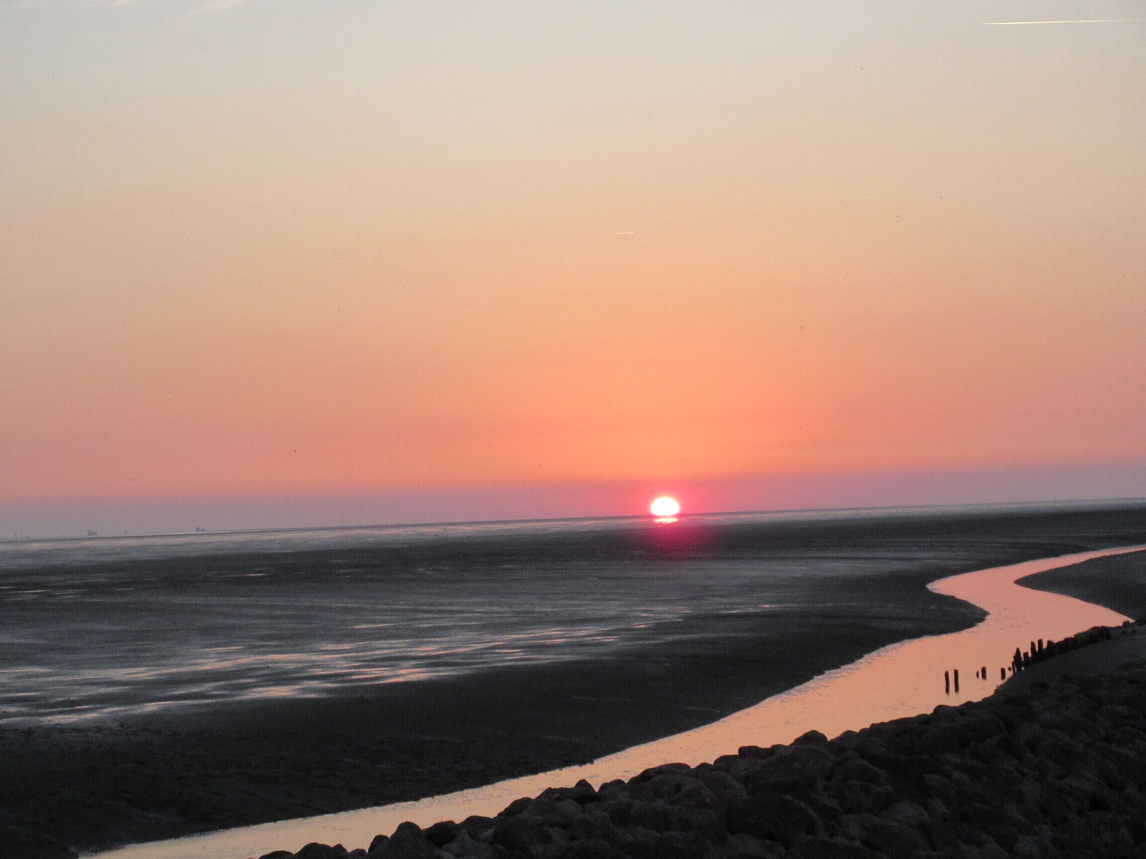 Sonnenuntergang am Wattenmeer in Wremen