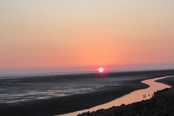 Sonnenuntergang am Wattenmeer in Wremen