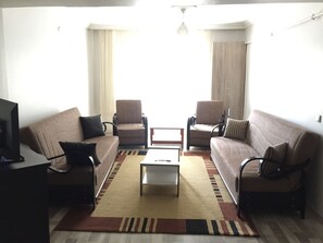 Apartment, 1 Bedroom | Living area | LCD TV, MP3 dock - Dogu Konaklama (Erzurum)