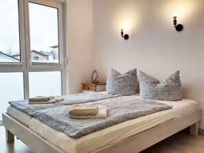 2 bedrooms, travel crib, WiFi, bed sheets