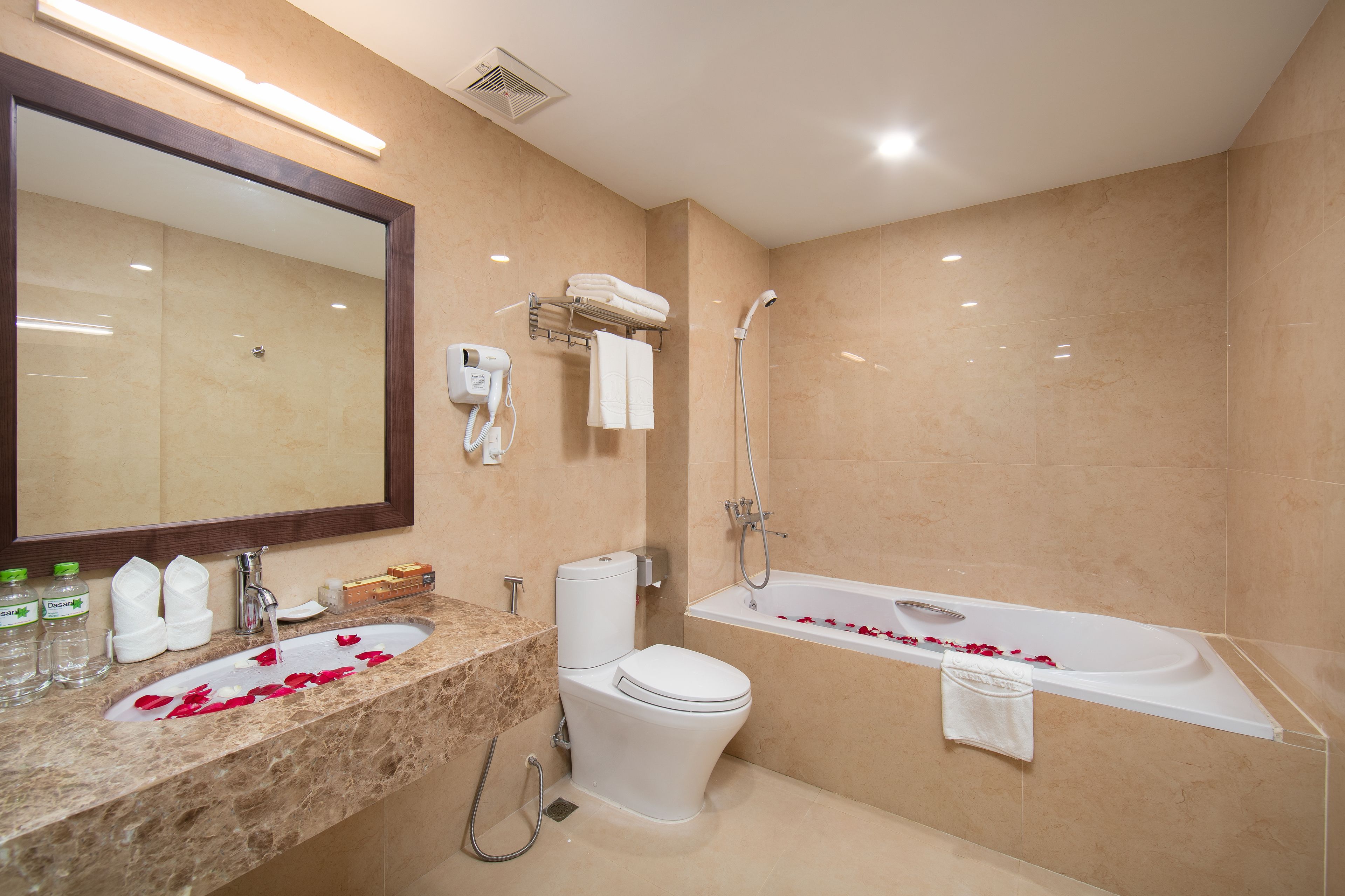 suite | bathroom | hair dryer, bathrobes, slippers, bidet