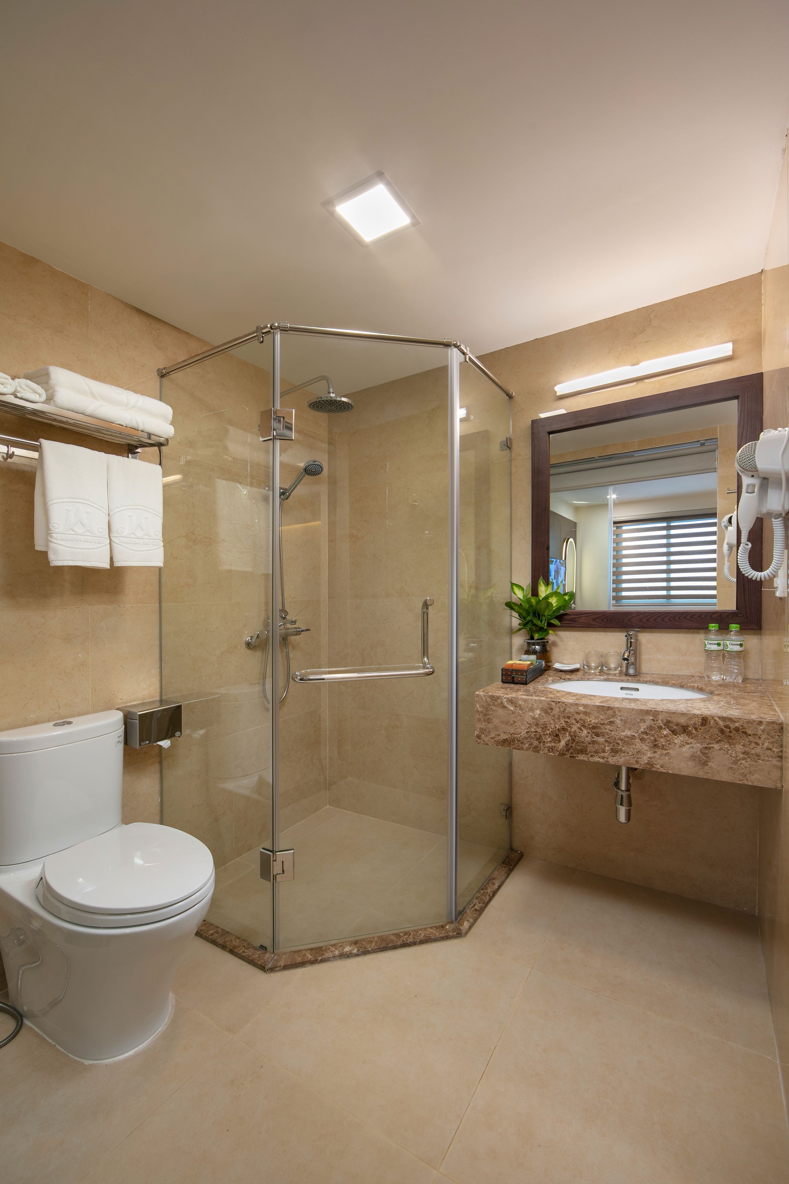 deluxe double room | bathroom | hair dryer, bathrobes, slippers, bidet