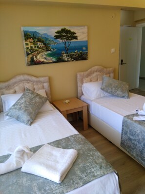 Quadruple Room | Blackout drapes, free WiFi, bed sheets - Merveille Hotel (Kusadasi)