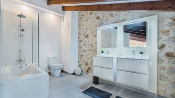 Bathtub, hair dryer, towels
