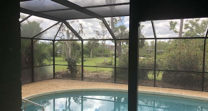 1.3 Acres PETS Waterfront FUN! Caged/Heated Pool, 100' Pier, CANOES Kayaks incl!