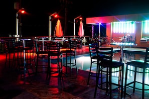 Outdoor pool, open noon to 11:00 PM, free pool cabanas, pool umbrellas