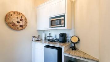 Fridge, microwave, coffee/tea maker, paper towels