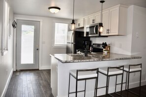 Fridge, microwave, oven, stovetop - Adorable Bungalow w/ Private Patio Mins away from Downtown Rapid City (Rapid City)