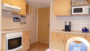 Fridge, microwave, oven, high chair