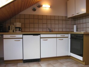 Fridge, oven, electric kettle, toaster