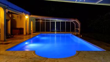 Indoor pool, outdoor pool, pool umbrellas, pool loungers