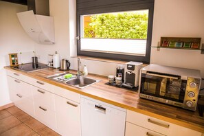Fridge, oven, dishwasher, highchair