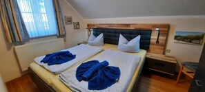 2 quartos, berço de viagem, Wi-Fi, roupa de cama