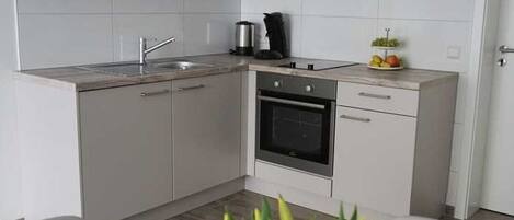 Fridge, oven, high chair