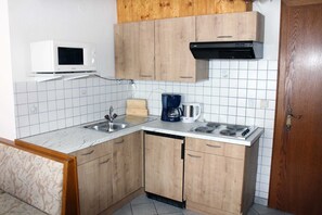 Fridge, microwave, high chair