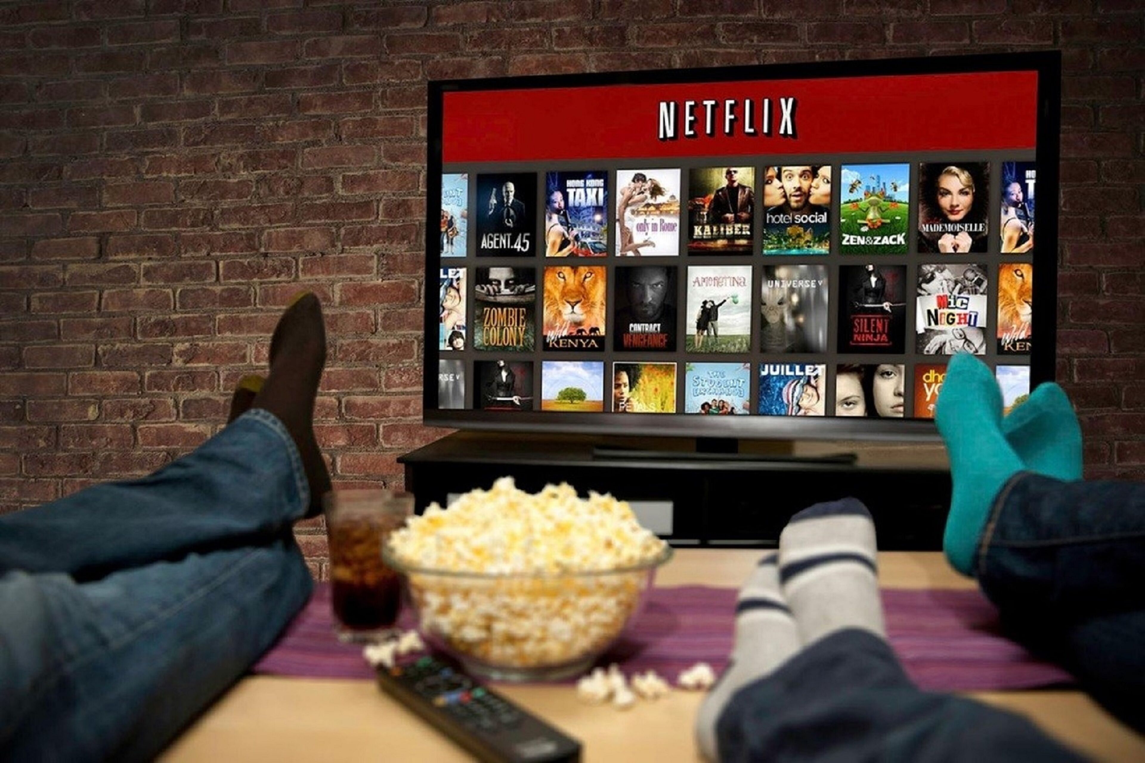 A television displaying a Netflix interface with various movie thumbnails.