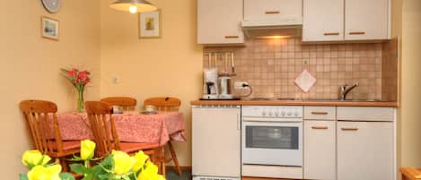 Fridge, microwave, oven, high chair
