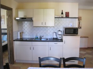 Fridge, microwave - Two-Bedroom Apartment (1) - Pension Vanii (Rust)