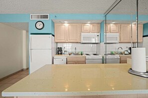 Full-size fridge, microwave, oven, stovetop - Ground Floor 1BR – Oceanfront on the Boardwalk (Virginia Beach)