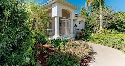 Large 3 bedroom Waterfront Canal Home with dock, boat lift and heated pool.