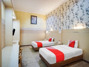 Habitación Deluxe con 2 camas individuales | Escritorio, wifi gratis y ropa de cama 